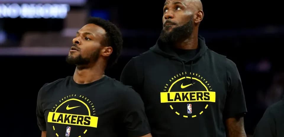 Two Lakers players during pre-game warm-up