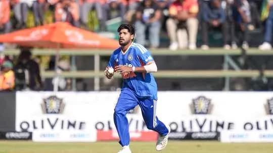 Cricketer running during a match on the field