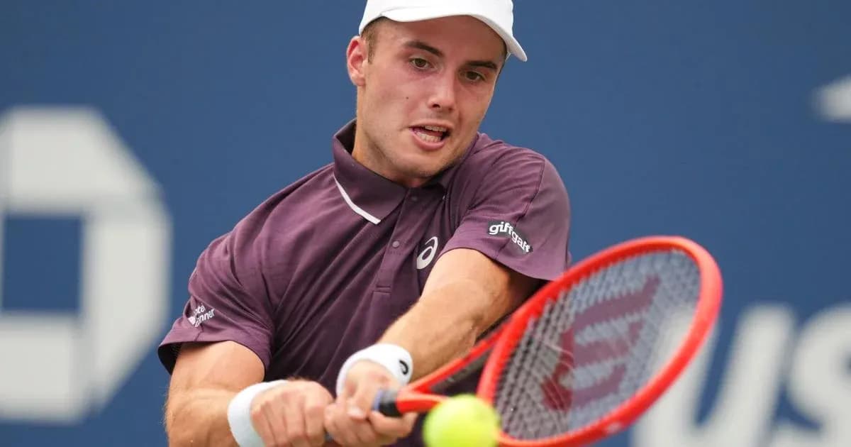 Player hitting a forehand during a tennis match