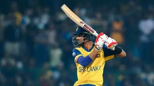 Batsman from Sri Lanka preparing to hit ball