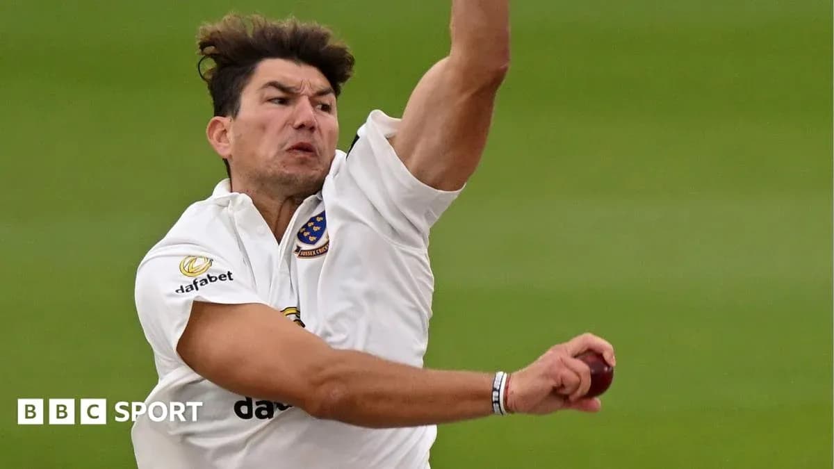 Bowler delivering a ball during cricket match