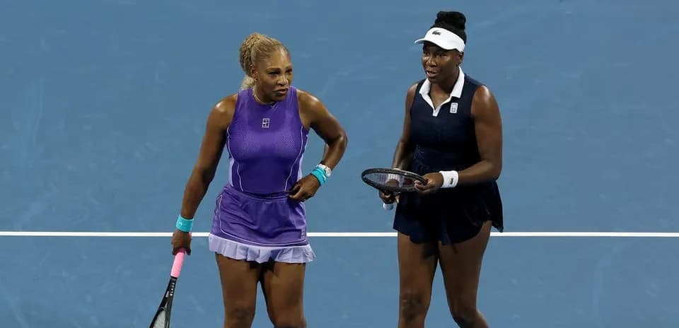 Serena and Venus Williams during a doubles match
