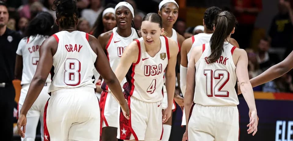 USA women's basketball team celebrating during game