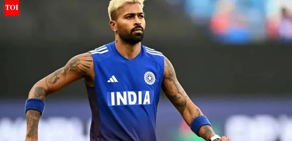 Cricketer warming up in blue India jersey