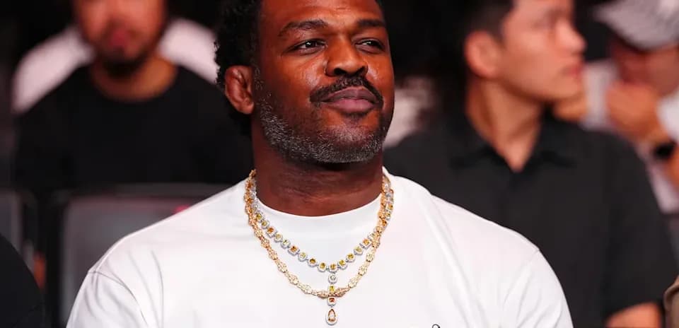 Man wearing jewelry at an event