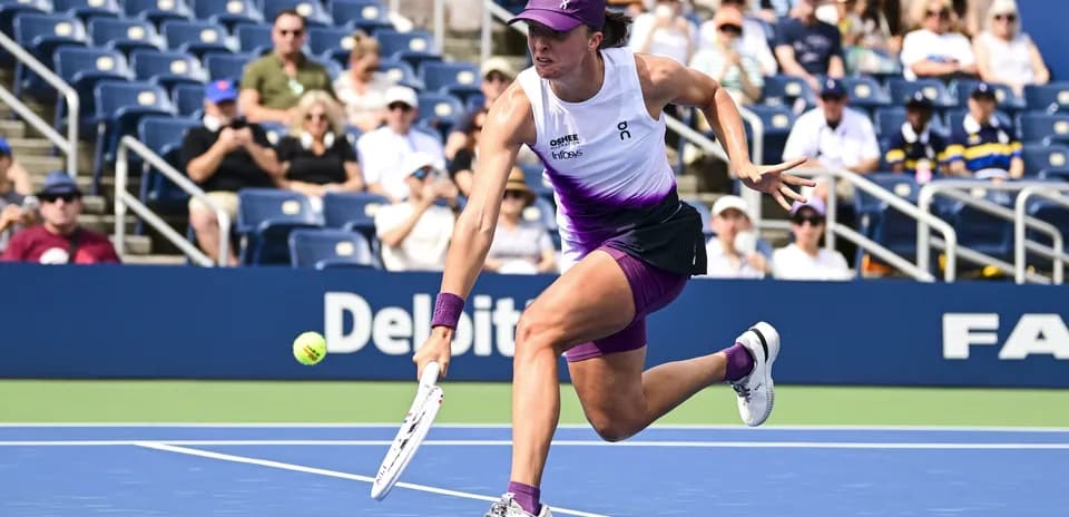 Player returning a tennis ball during a match