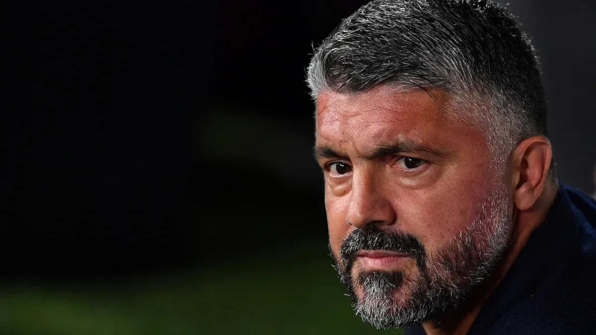 Coach looking focused during match from sidelines