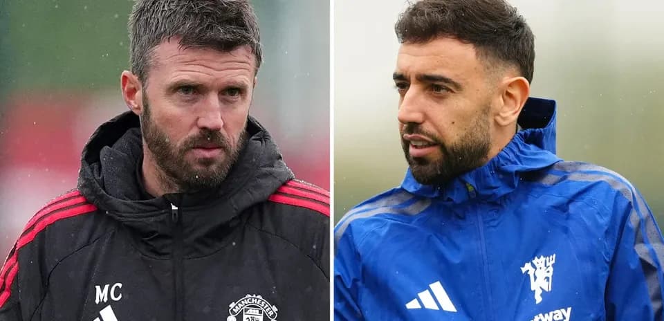 Two football coaches during training session outdoors
