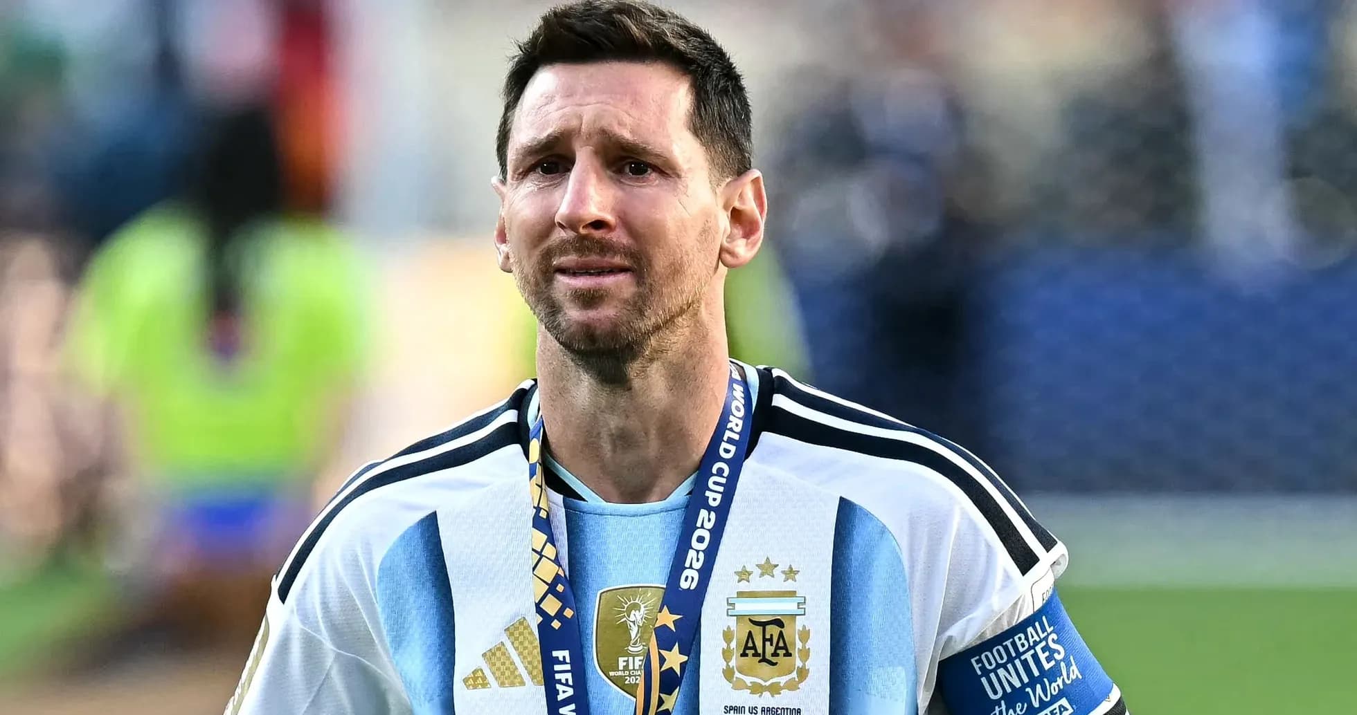 Player in Argentina jersey with World Cup medal