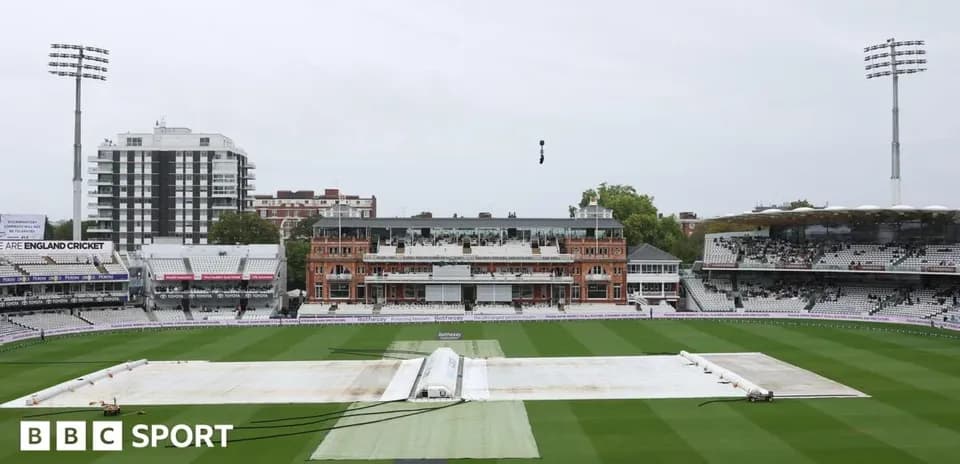 Cricket ground at Lord's with covers on pitch