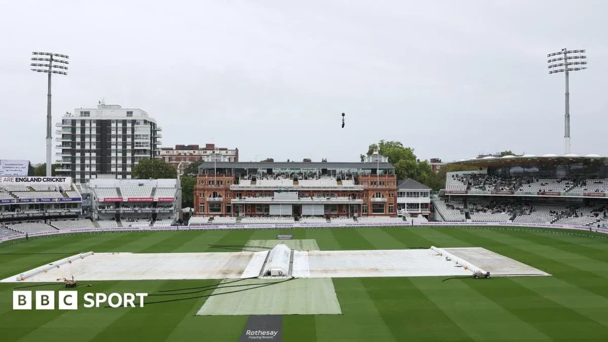 Cricket ground at Lord's with covers on pitch