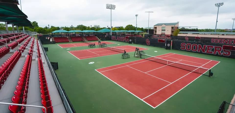 Tennis courts at Oklahoma University with seating area