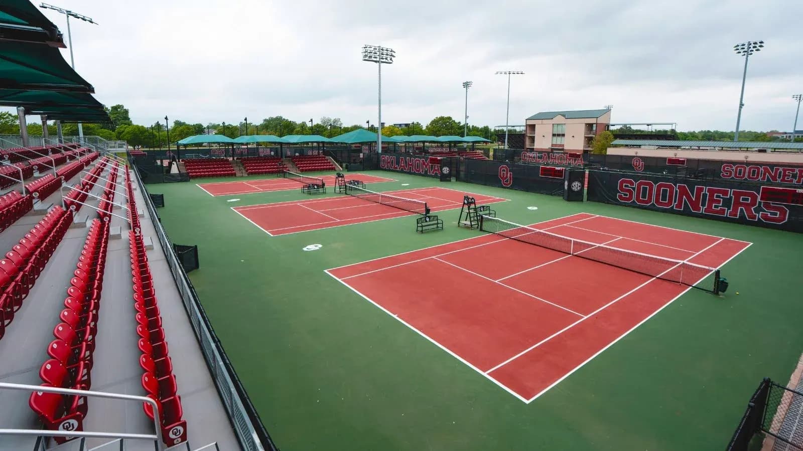 Tennis courts at Oklahoma University with seating area