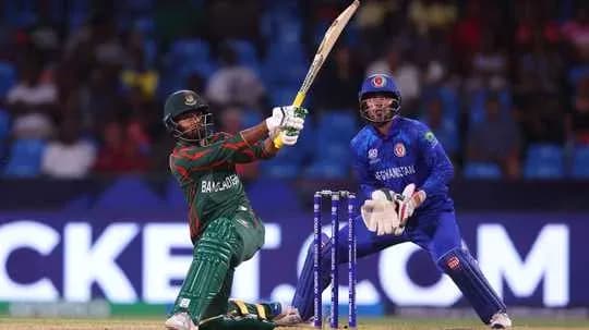 Batsman hitting ball with bowler in stance