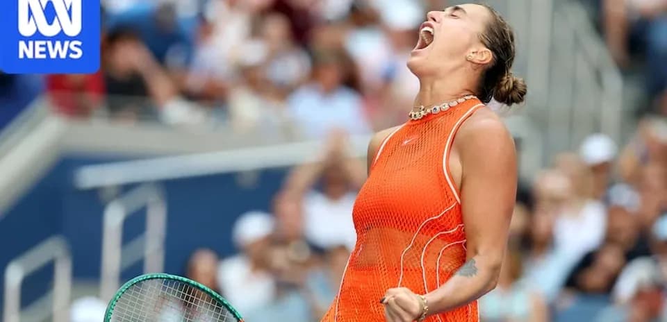Tennis player celebrating a victory on court