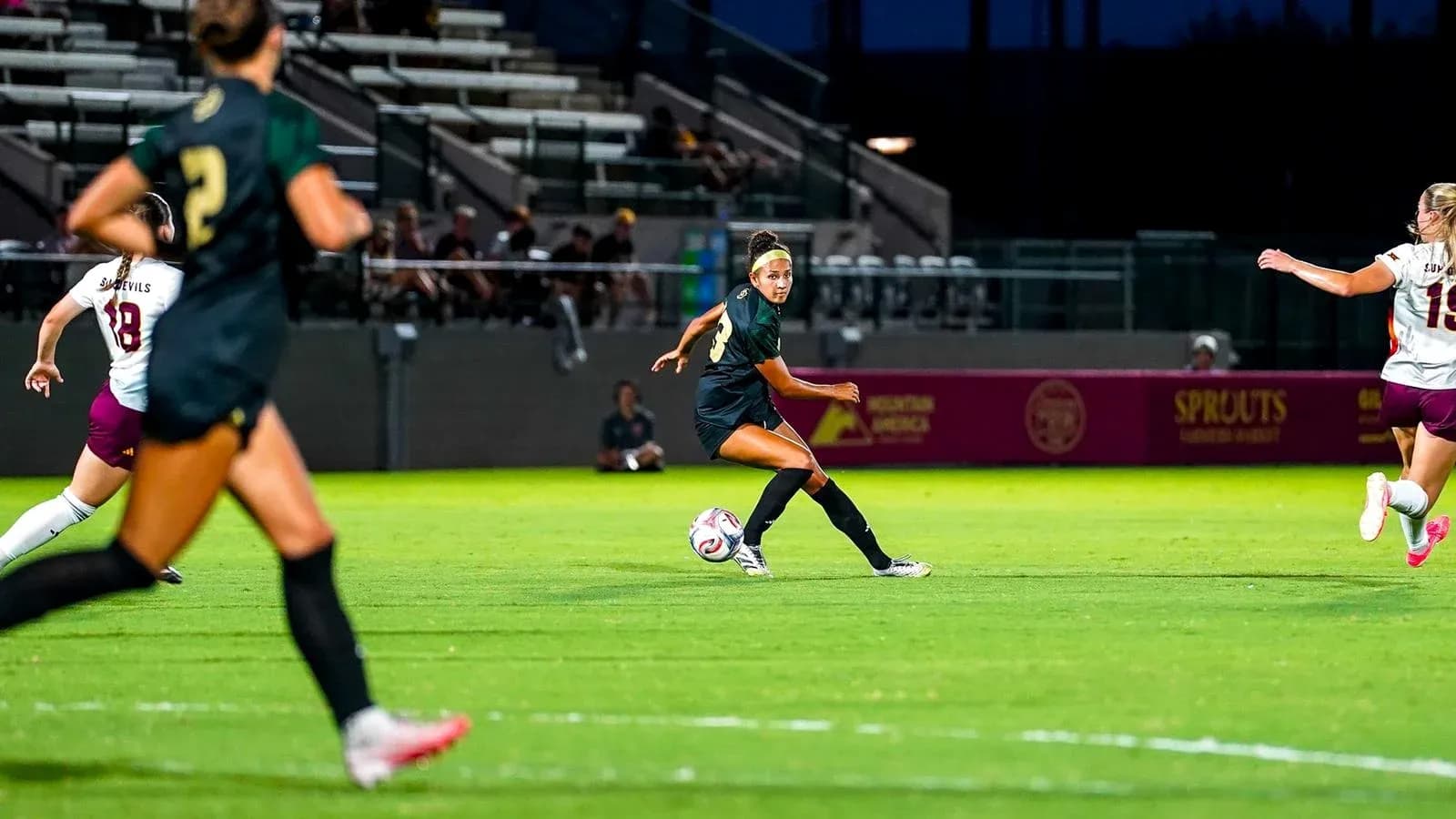 Player passing the ball during a soccer match