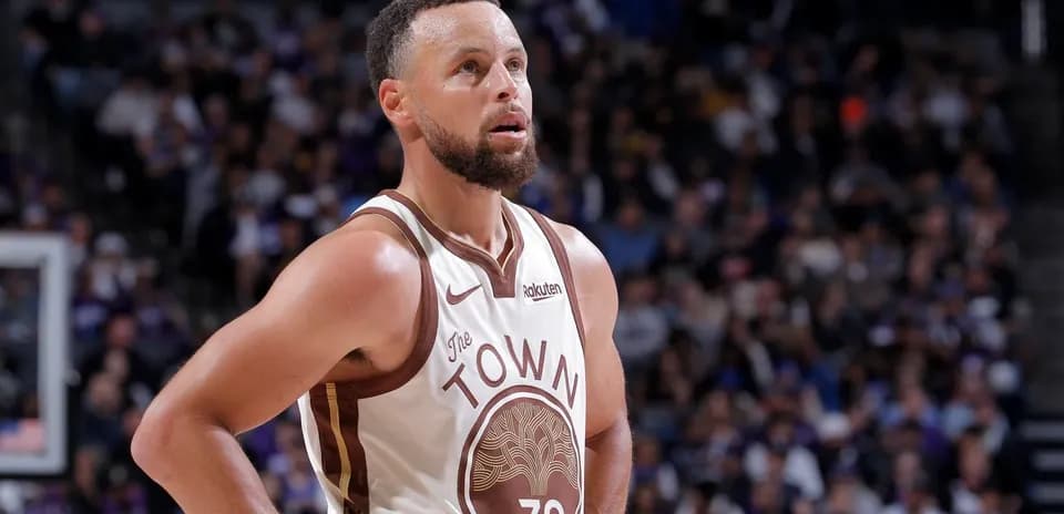 Player in Golden State Warriors jersey during game