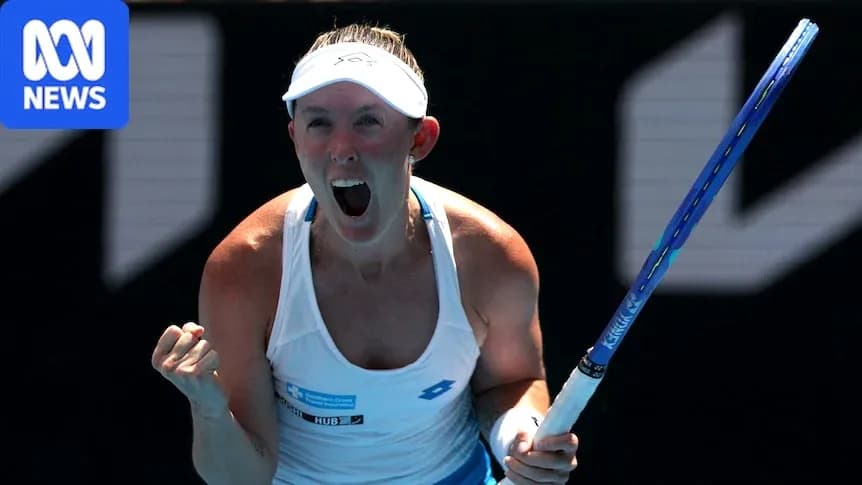 Tennis player celebrating with racket after winning point