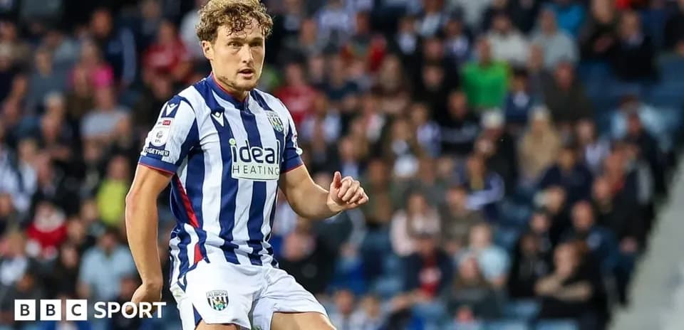 Player in striped West Bromwich Albion kit during match