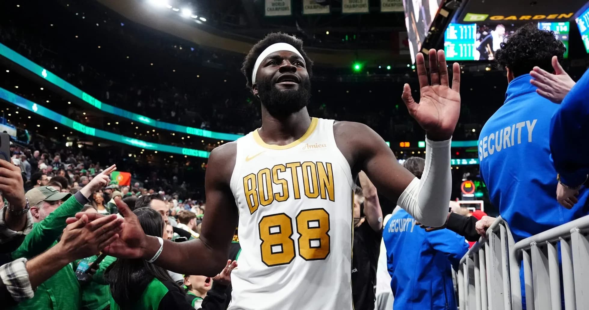 Player waving to fans after a game at TD Garden