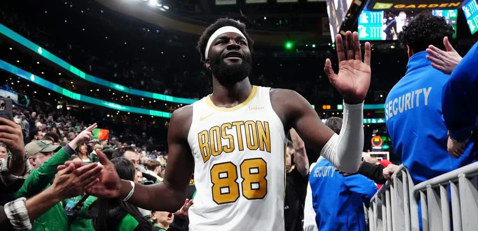 Player waving to fans after a game at TD Garden