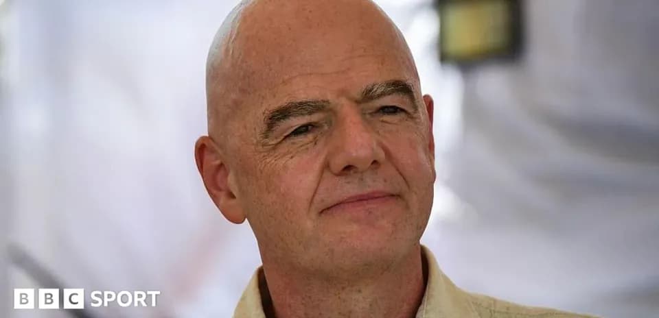 Man with bald head posing for camera