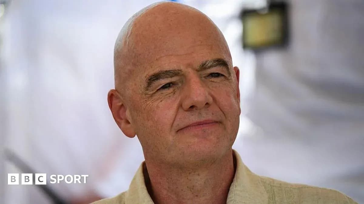 Man with bald head posing for camera