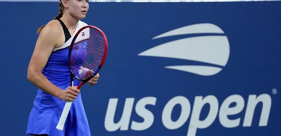 Female tennis player holding racket at US Open
