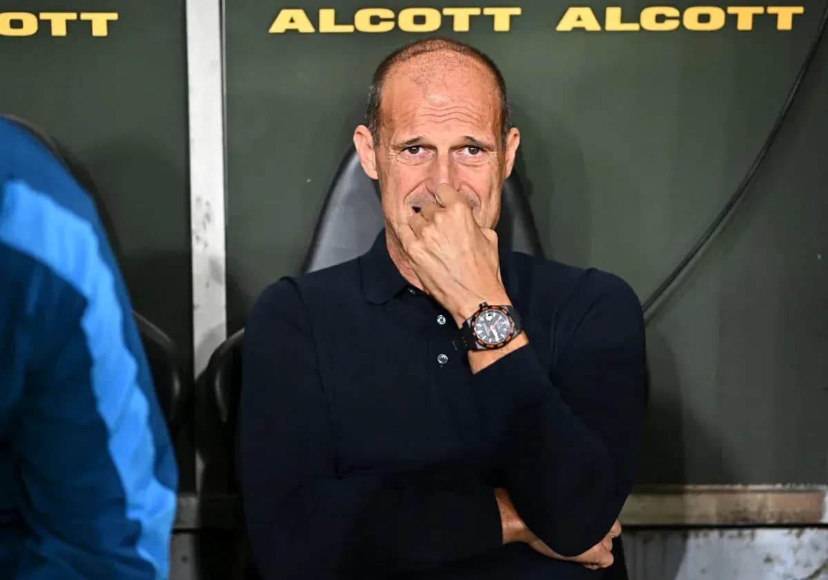 Coach sitting on the bench during a match