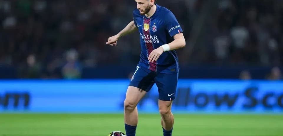 Player dribbling ball during match on the field