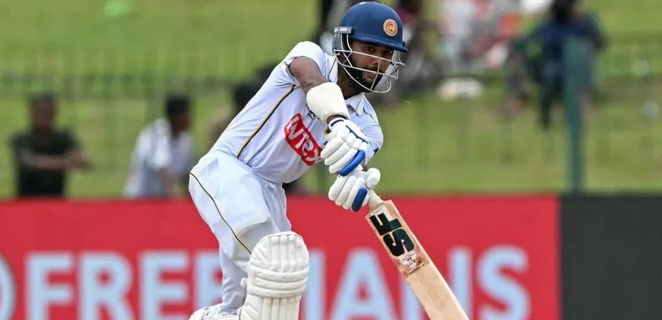 Batsman playing a shot during cricket match