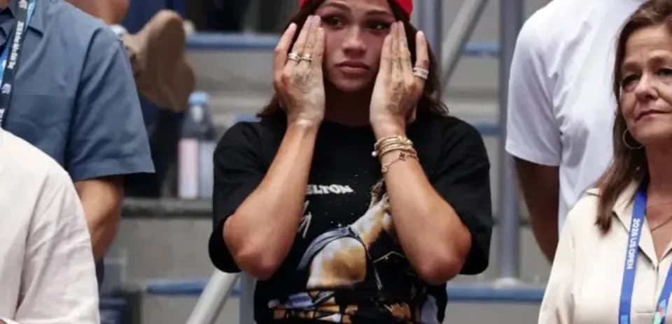 Fans watching nervously at a tennis match