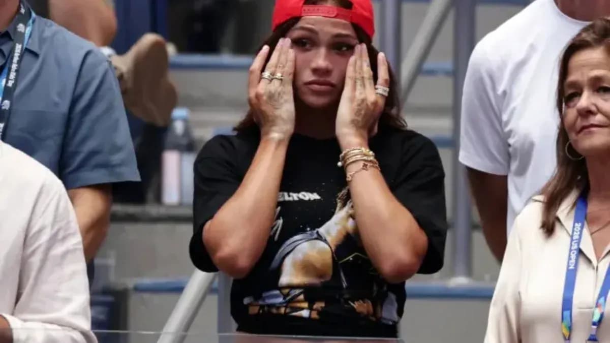 Fans watching nervously at a tennis match