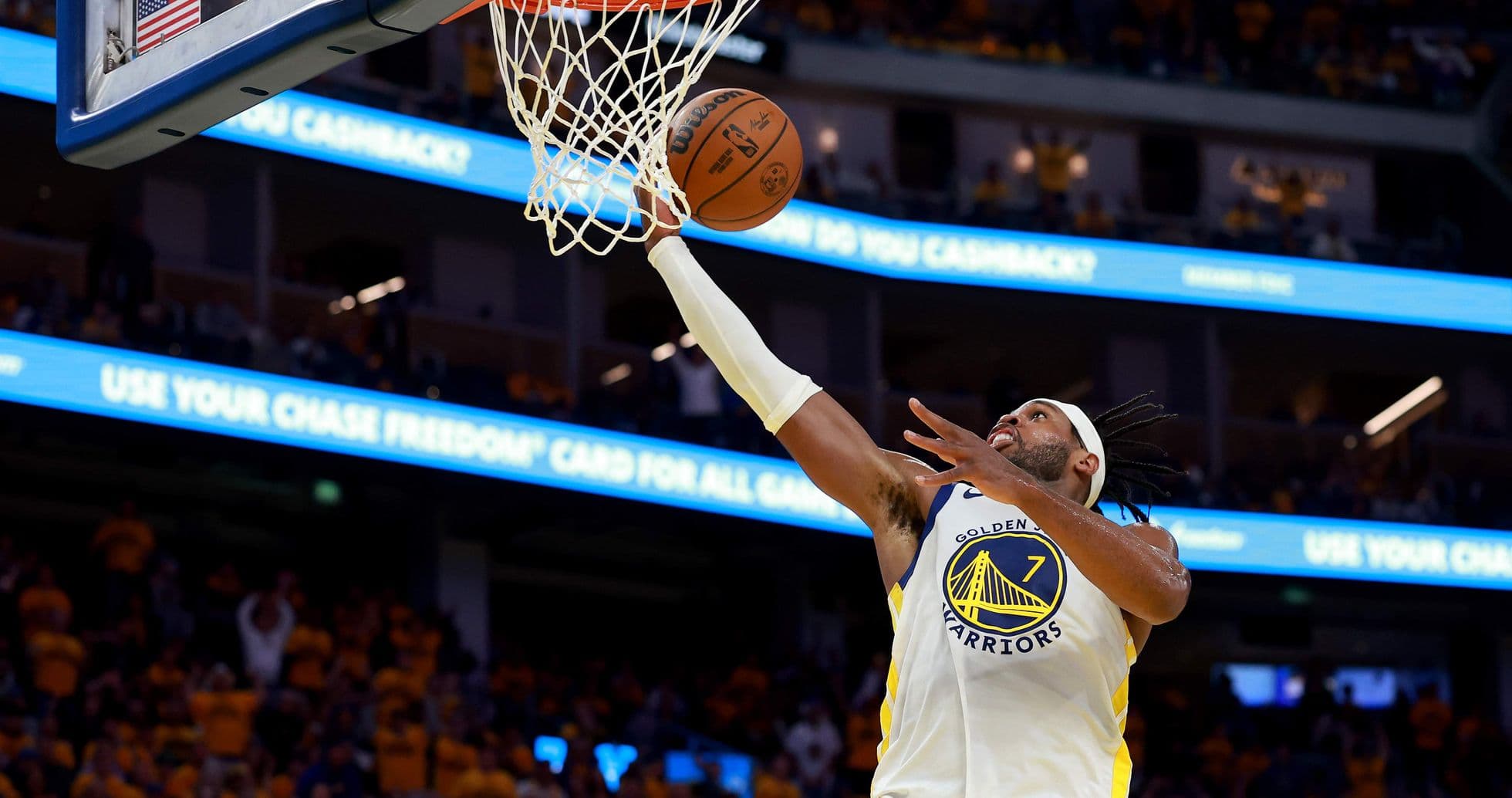 Player dunking the basketball during a game