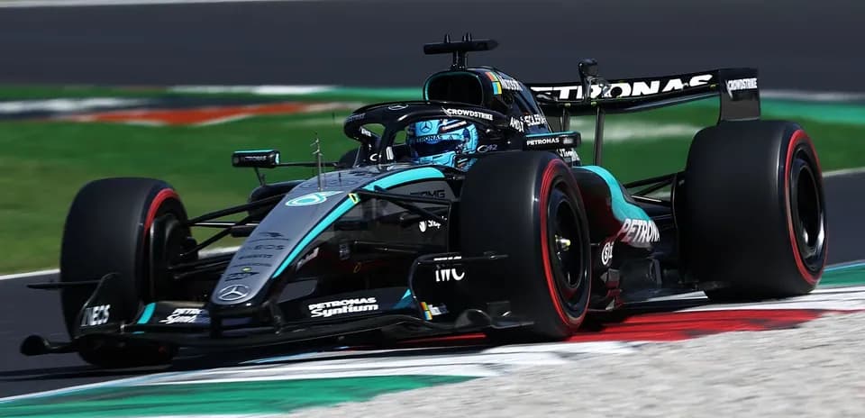 Mercedes F1 car racing on track during event