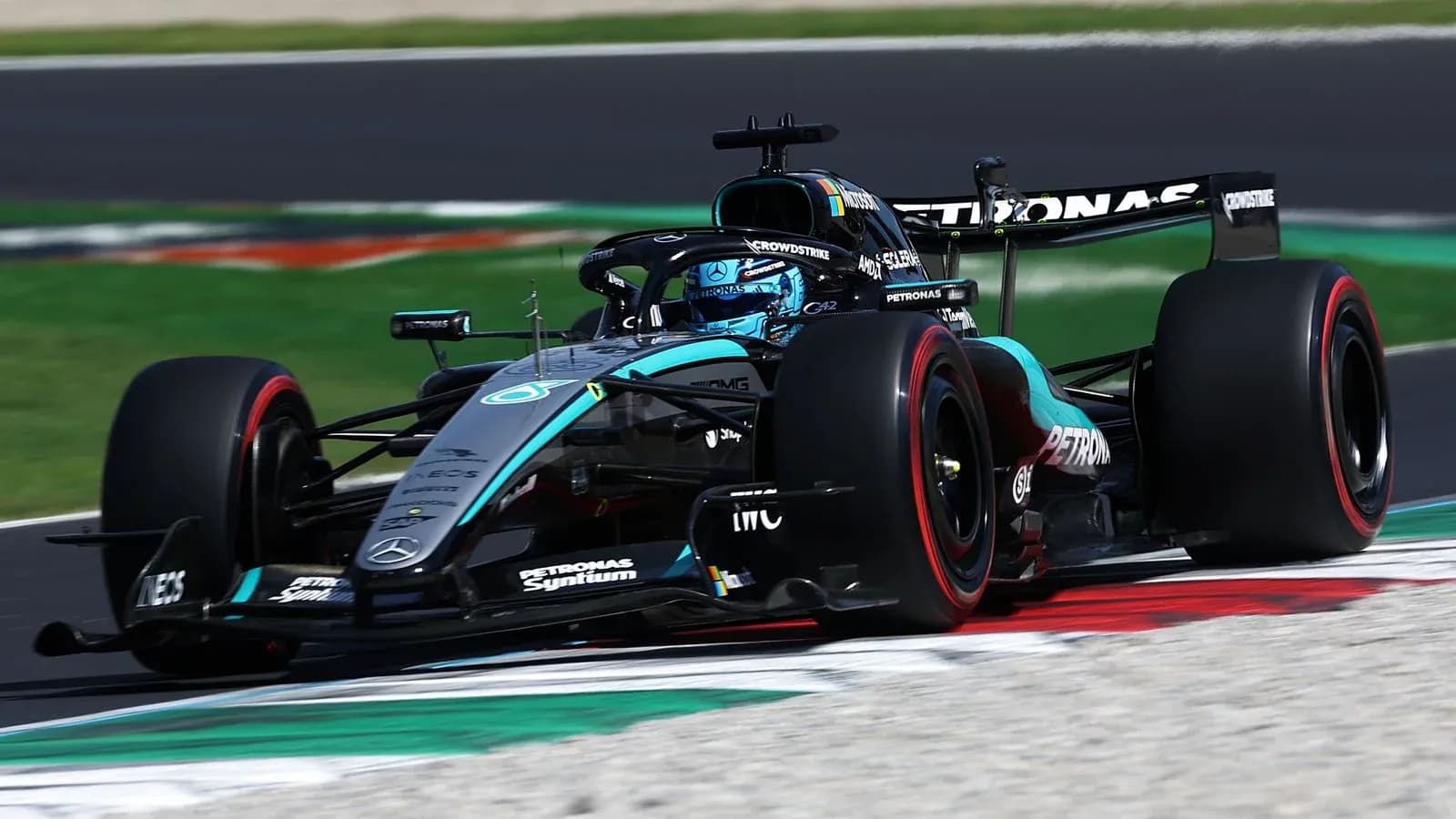Mercedes F1 car racing on track during event