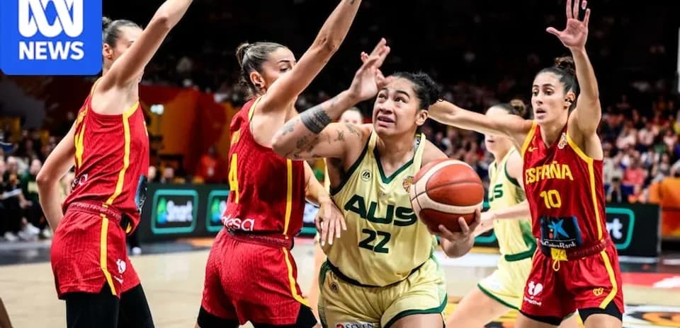 Player driving to the basket during basketball game