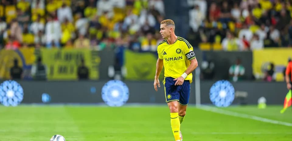 Player in yellow jersey on the field during match