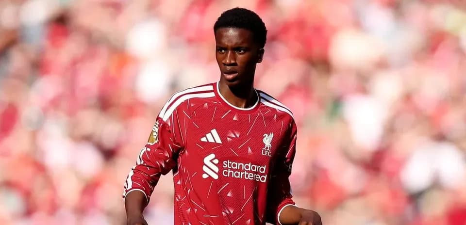 Player in Liverpool kit during match at stadium