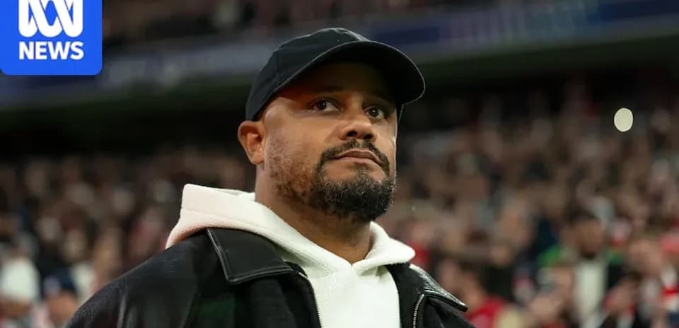 Man in black cap observing a sports event