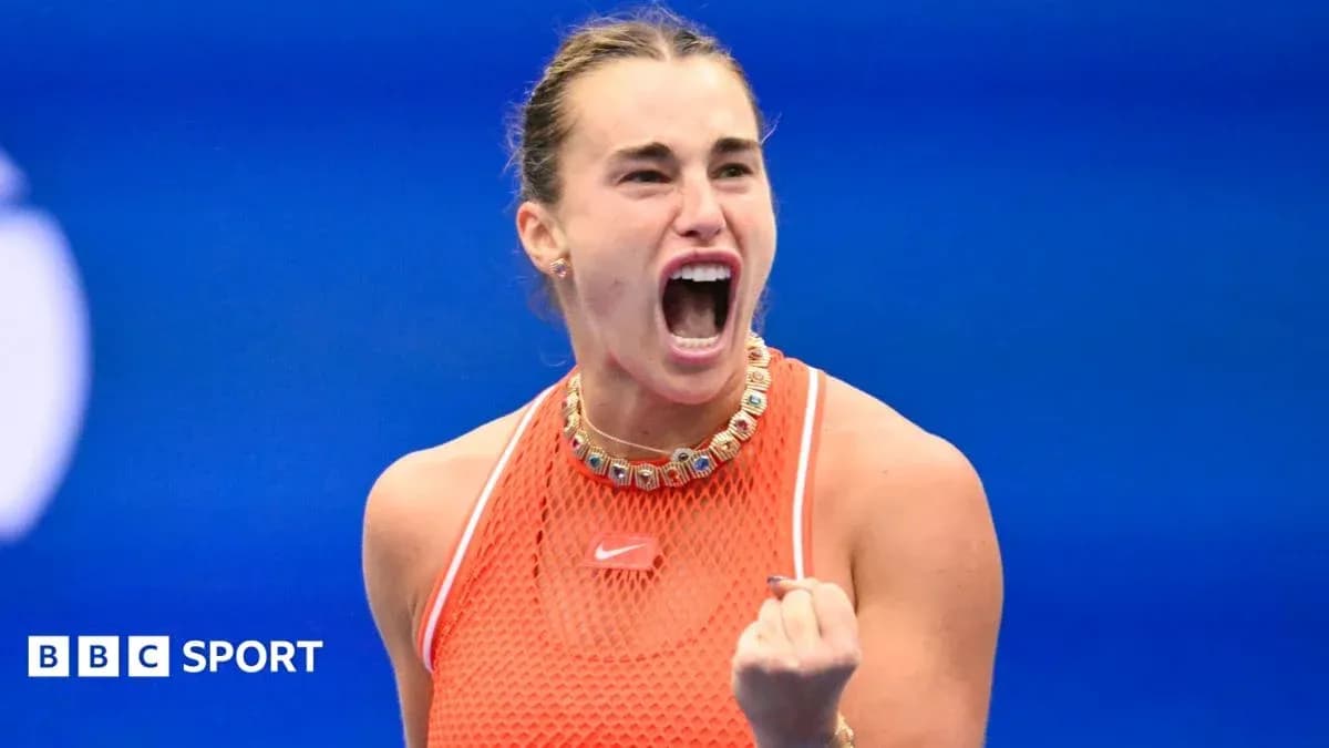 Tennis player celebrating victory with a fist pump