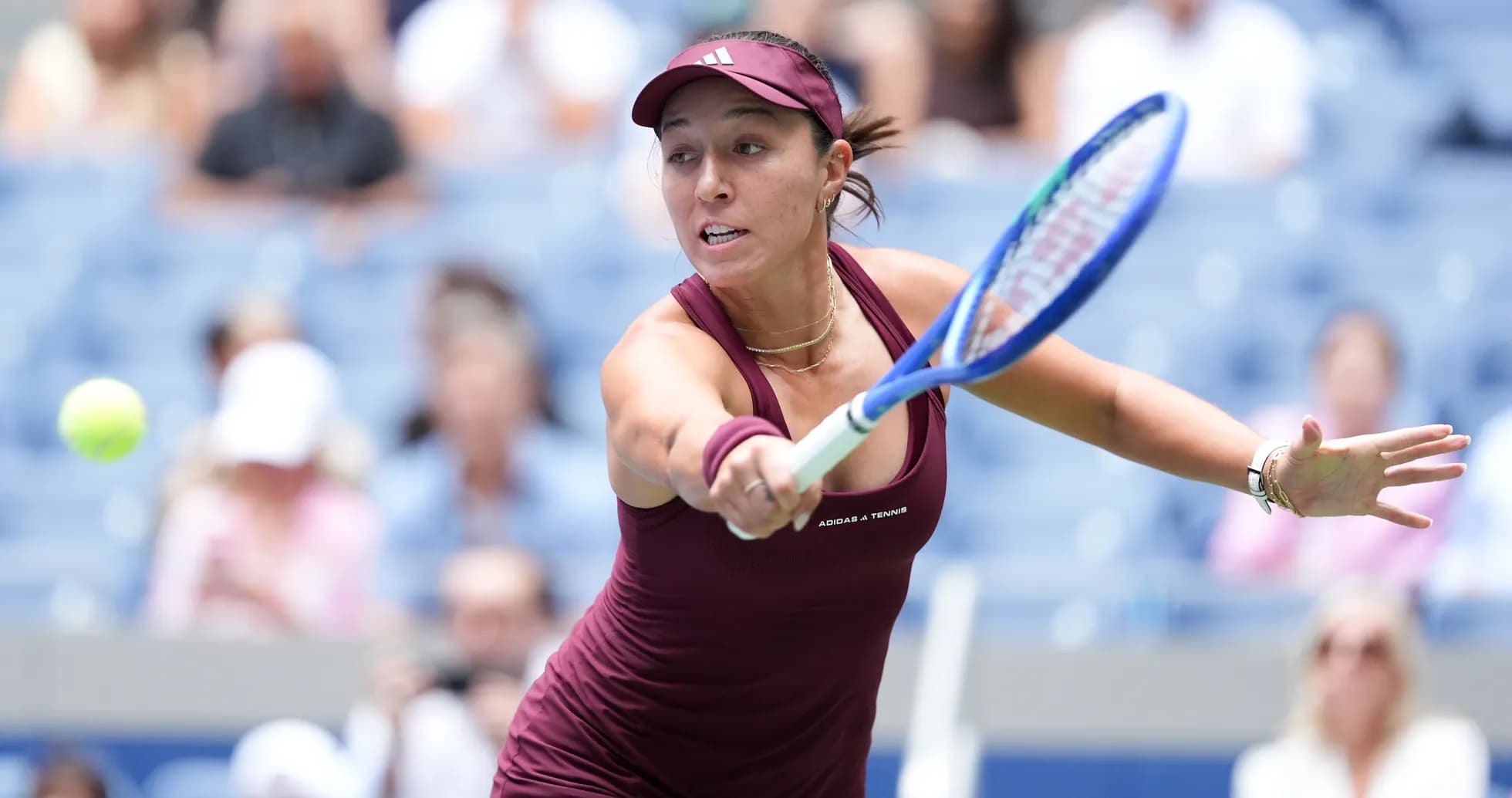 Player hitting a forehand during tennis match