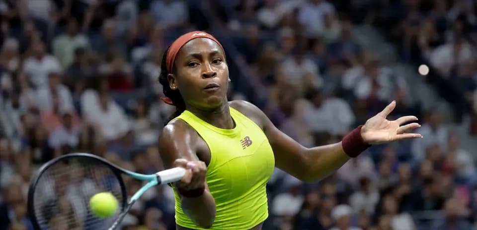 Coco Gauff hitting a backhand during match