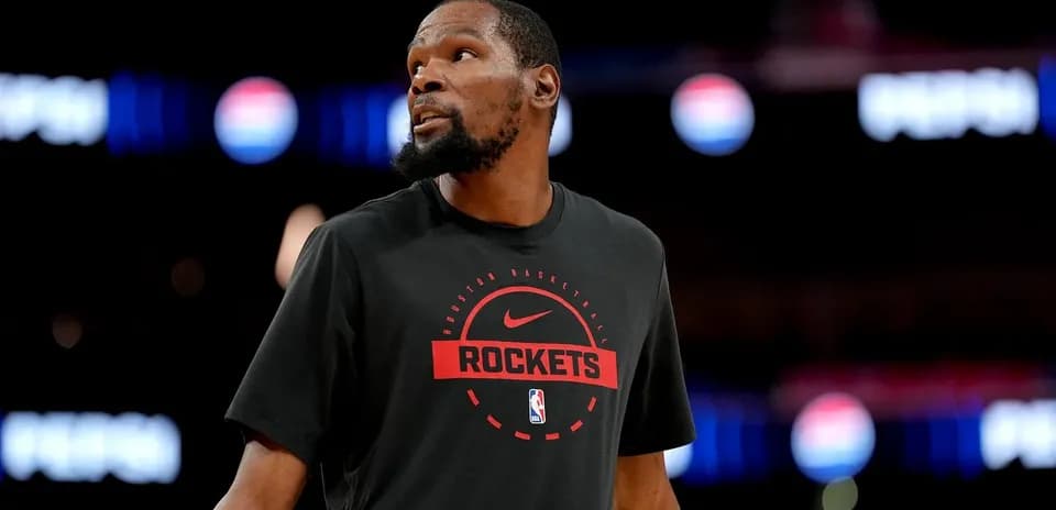 Player wearing Houston Rockets shirt during warm-up