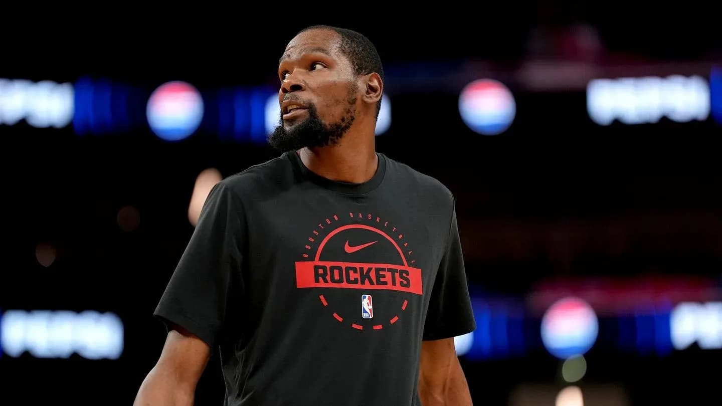 Player wearing Houston Rockets shirt during warm-up