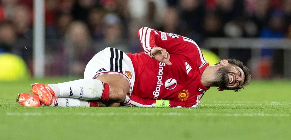 Player lying on the ground, injured during match