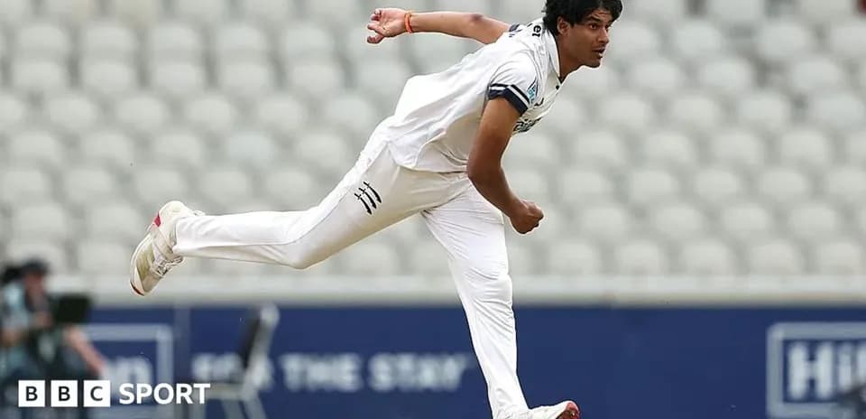 Bowler delivering a ball during cricket match