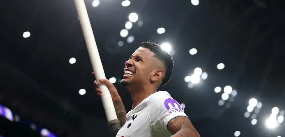 Player celebrating with a pole at the stadium