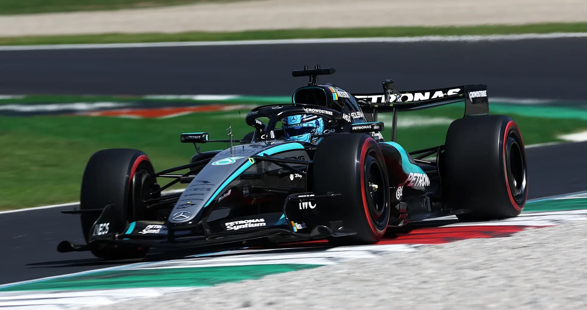 Mercedes F1 car racing on track during event