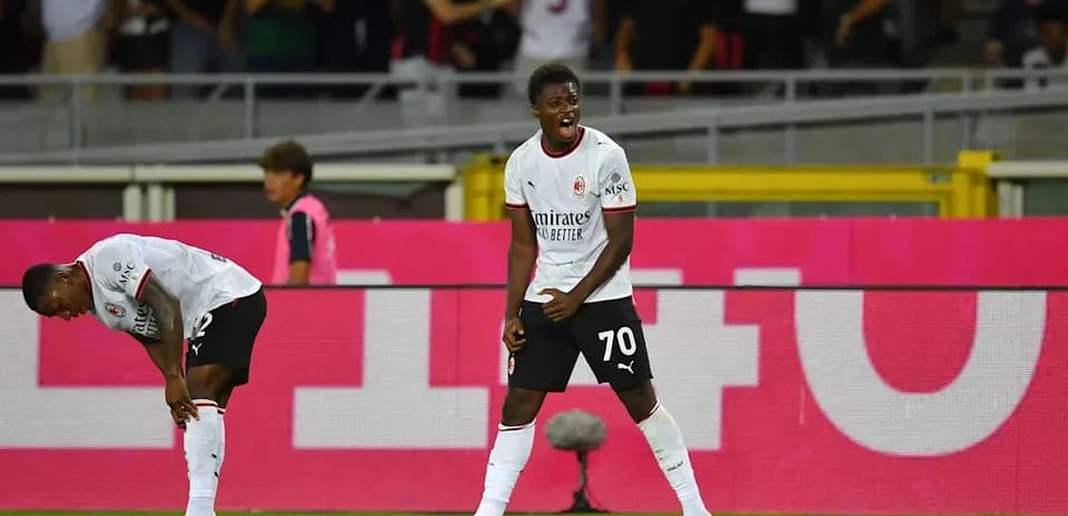 AC Milan player celebrating during a match
